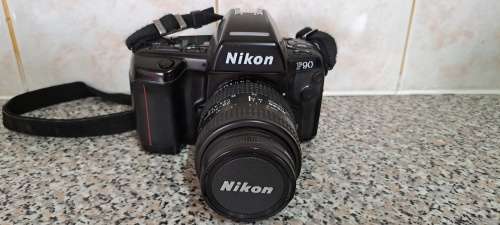 Nikon Camera F90 + Nikon AF Nikkor Lens 28 - 70 mm 1 : 35 - 4.5D - Nikon Speedlight Flash SB -25