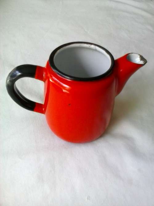 Enamel jug, red with black trim