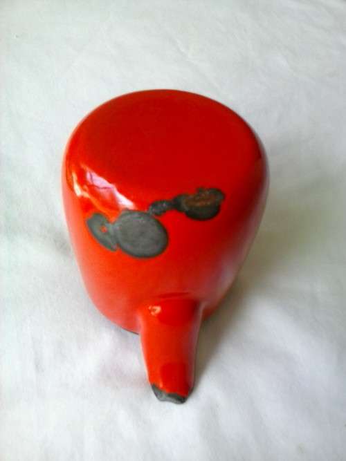 Enamel jug, red with black trim