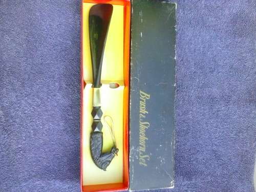 Vintage shoe horn with handle shaped like a horse's head, original box