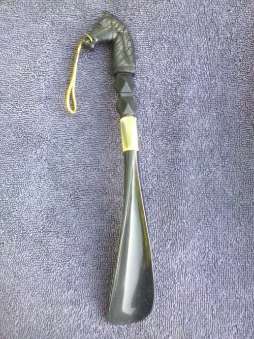 Vintage shoe horn with handle shaped like a horse's head, original box