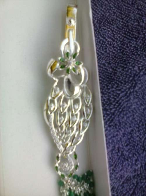 Silver coloured metal keyring with green beads, new in box - never used, 13.5cm long