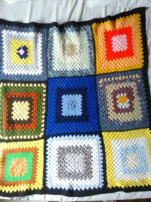Crochet throw, used in good condition, approximately 100cm x 100 cm