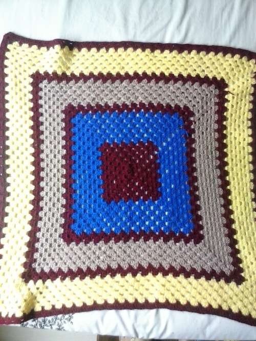 Crochet throw maroon/ yellow, used in good condition, approximately 71cm x 71 cm
