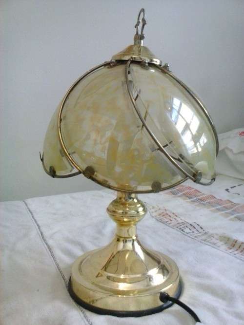 Tiffany-style electric lamp. Working fine, but shows a lot of use.