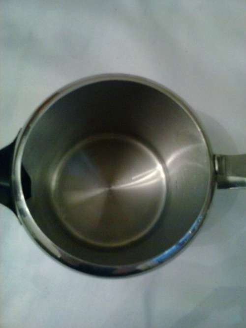 Stainless steel water jug, holds 750ml. Excellent condition. 12 cm high, 9cm dimeter.