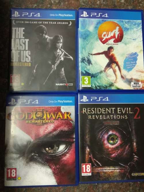 PS4 Game Bundle: Last of Us, Surf World Series, God of War 3, Resident Evil 2 Revelations