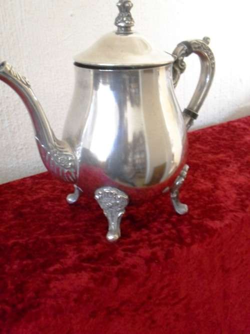 Lovely footed silver-plated teapot
