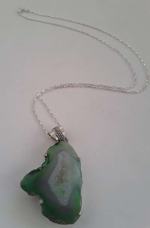 Sterling silver and natural jade pendant with 925 chain.  Stunning!!!