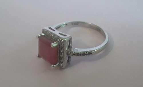 925 Sterling silver ring with beautiful burnt orange stone. Size: N