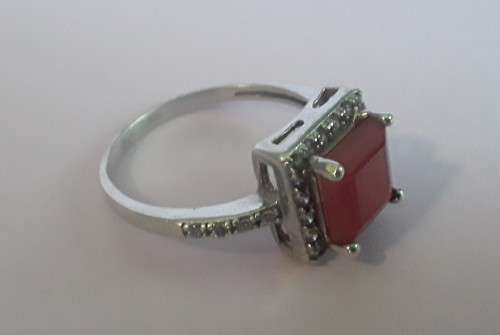925 Sterling silver ring with beautiful burnt orange stone. Size: N