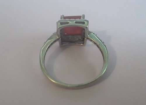 925 Sterling silver ring with beautiful burnt orange stone. Size: N