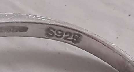 925 Sterling silver ring with beautiful burnt orange stone. Size: N