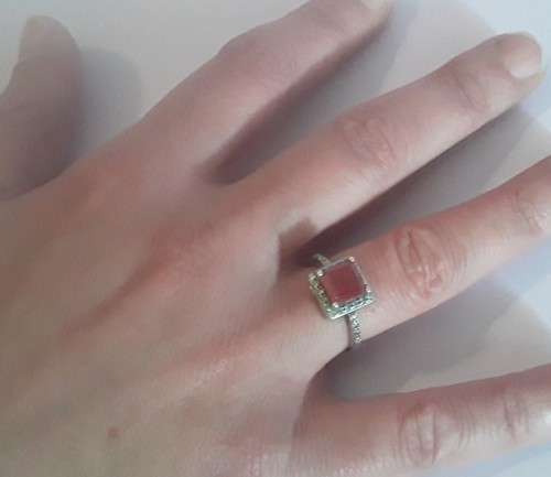 925 Sterling silver ring with beautiful burnt orange stone. Size: N