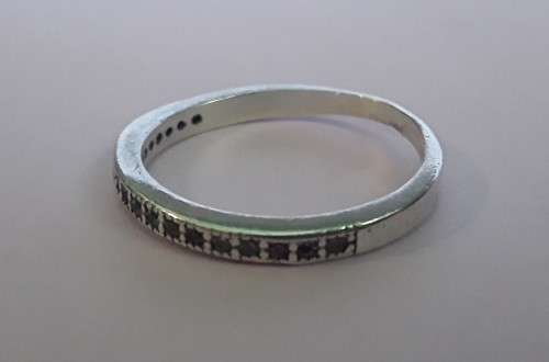 Solid sterling silver half eternity band ring.