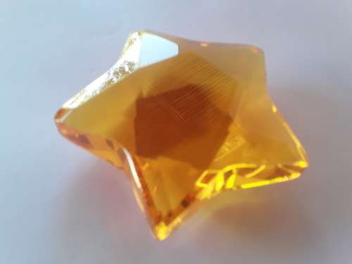 Vintage Rosenthal amber crystal paperweight.