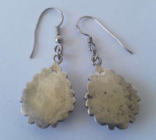 Solid sterling silver teardrop earrings with black stones. Possibly onyx