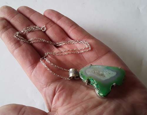 Sterling silver and natural jade pendant with 925 chain.  Stunning!!!