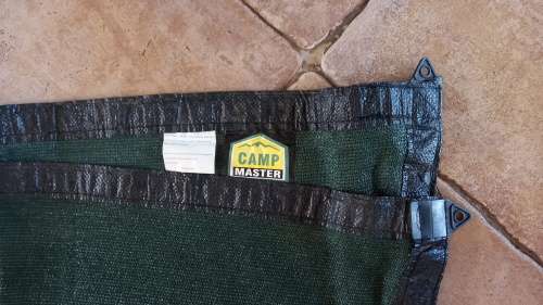 Camp Master green netted ground sheet for camping/caravan.