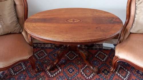 Antique Salon table oval, with solid carved wooden legs.
