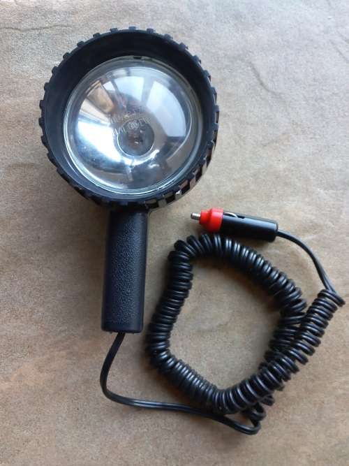 Handheld Quartz-Halogen 12Volt spotlight with 3.6 m. cable and cigarette lighter connection.