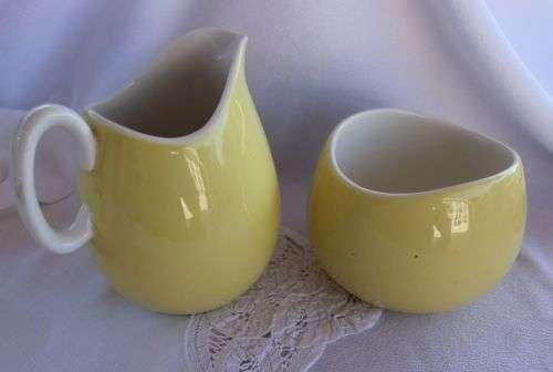 YELLOW CONTINENTAL SUGAR POT AND MILK JUG    RETRO