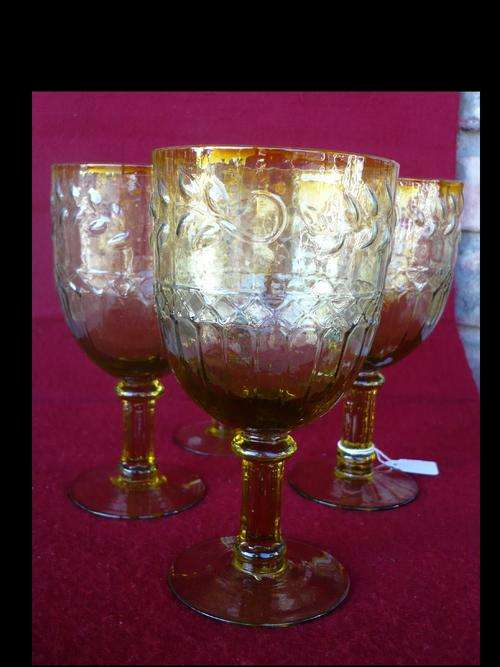 FOUR  ANTIQUE PRESSED GLASS WINE GLASSES