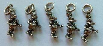 5 X 925 SILVER DONALD DUCK CHARMS.