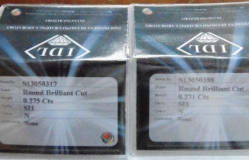 TWO IDENTICAL SIZE & GRADING CERTIFIED 0.27 POINTERS "GENUINE NATURAL DIAMONDS".ONE BID FOR BOTH!