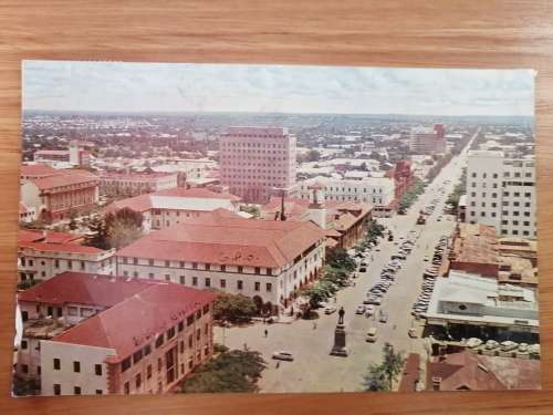 A used Postcard of Main Street, Bulawayo, Rhodesia