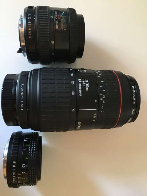 2 SLR Film cameras (Pentax P30t and Casio RF-3) and three lenses