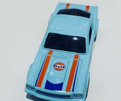 Collectible HotWheels - 65 Mustang Fastback - Mattel (2012)  Goodyear Gulf Branding