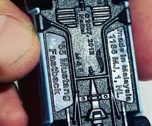 Collectible HotWheels - 65 Mustang Fastback - Mattel (2012)  Goodyear Gulf Branding