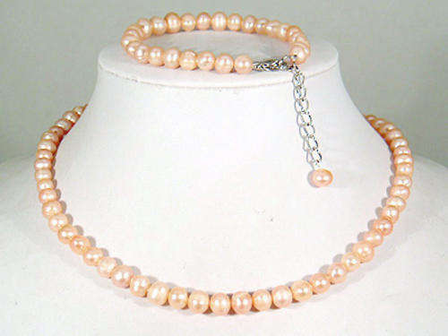 Peach freshwater pearl necklace and bracelet