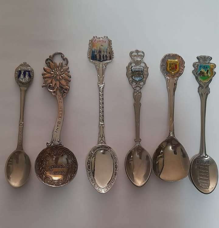 Vintage  collectable spoons on wall stand