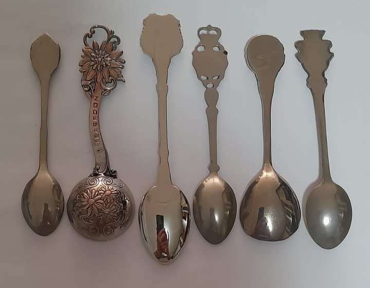 Vintage  collectable spoons on wall stand