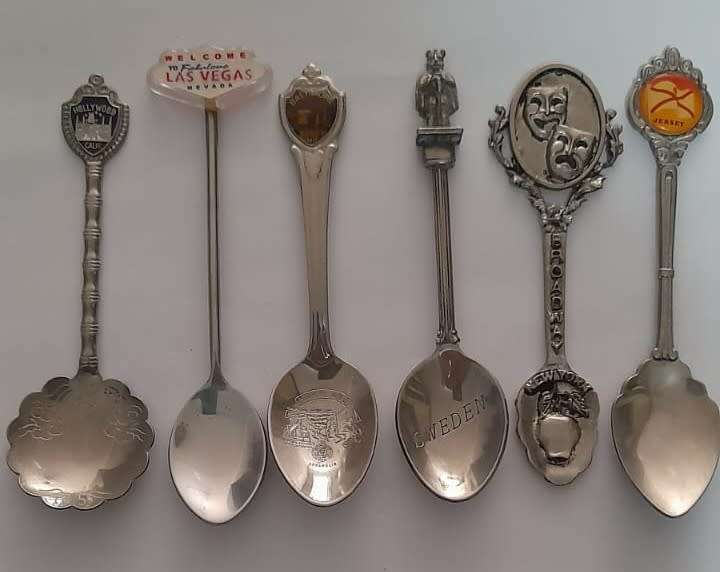 Vintage  collectable spoons on wall stand