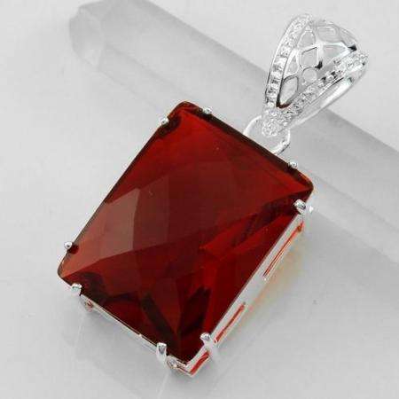 INCREDIBLE RED TOPAZ PENDANT 51CT SILVER