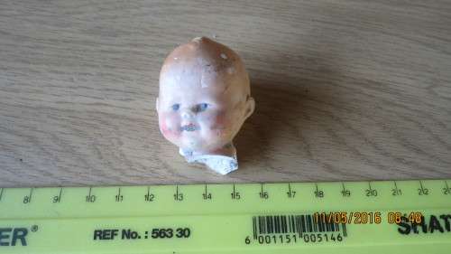 porcelain dolls head, as per photo