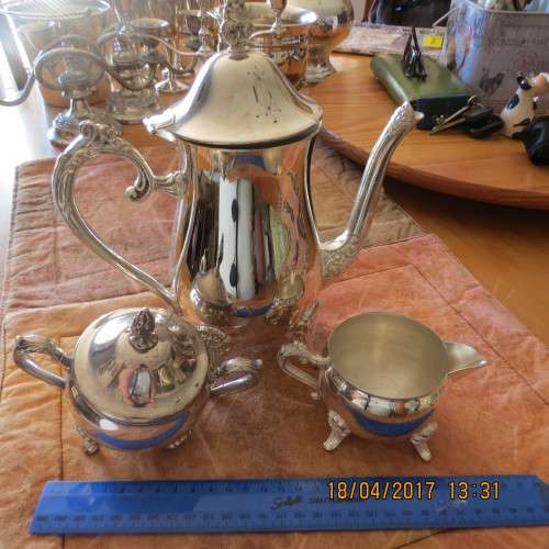 silver plated tea set, sugar bowl has one foot missing otherwise in very nice condition, as photo