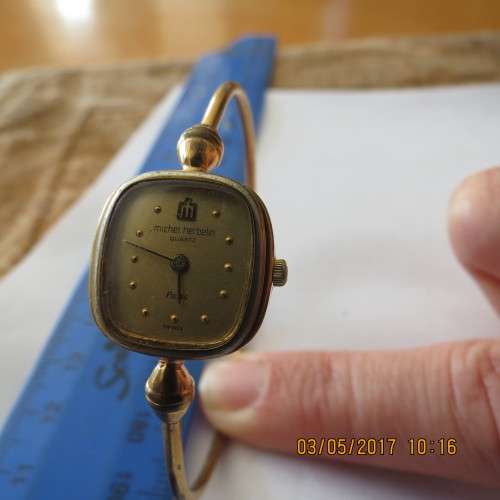 ladies gold Michelle Herbelin wrist watch, needs battery, sold as is, as per photo