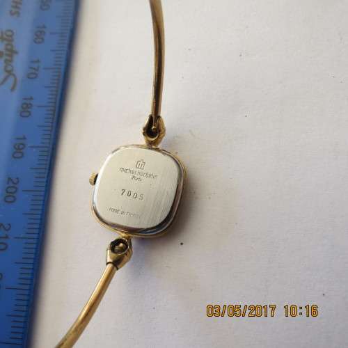 ladies gold Michelle Herbelin wrist watch, needs battery, sold as is, as per photo