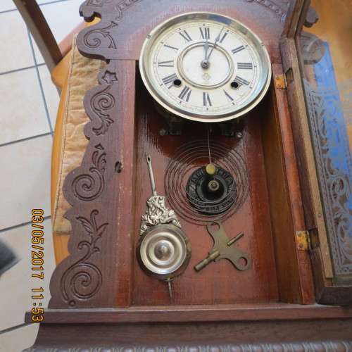 very attractive Ansonia clock, silvered glass, wooden case, in working order, sold as is, as photo