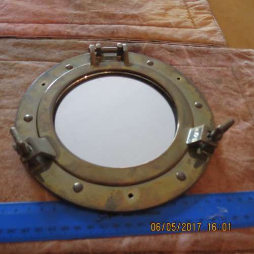 Brass porthole, 20.5cm diameter, can open, with loose mirror, as per photo