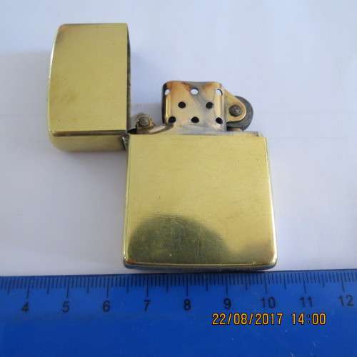 Zippo lighter marked solid brass, as per photo