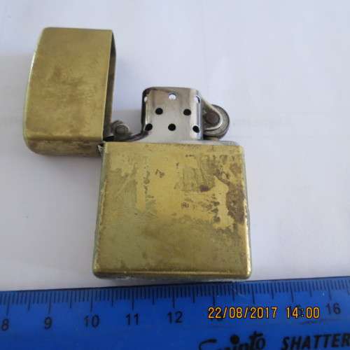 Zippo lighter marked solid brass, as per photo