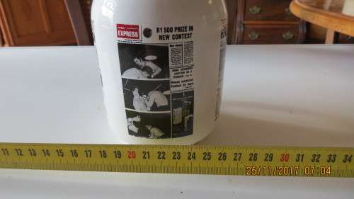 porcelain beer mug, by Crescent ware, with various newspaper printed on it, as per photo