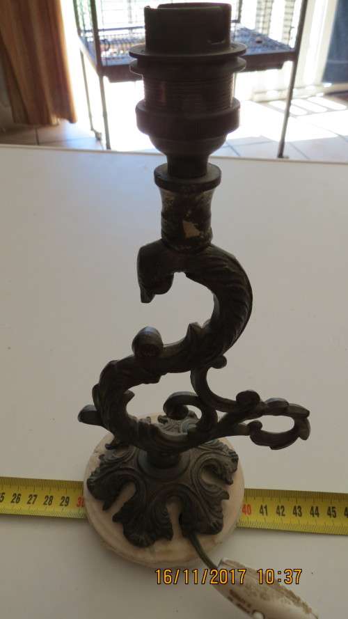 metal candlestick made into lamp on clay base, 25cm high, as per photo