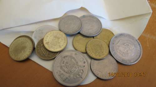 13 Spanish coins, as per photo