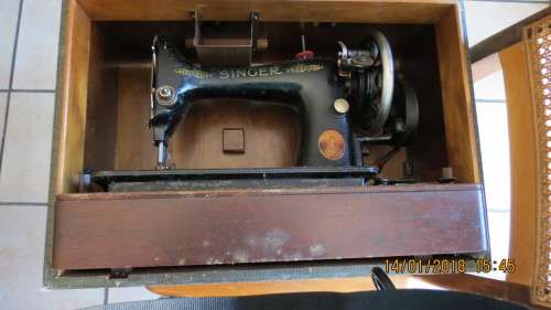 Singer sewing machine in box with accessories, as per photo